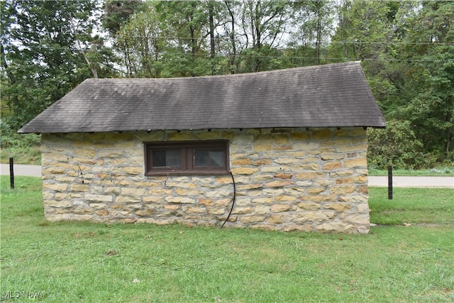 view of property exterior featuring a yard