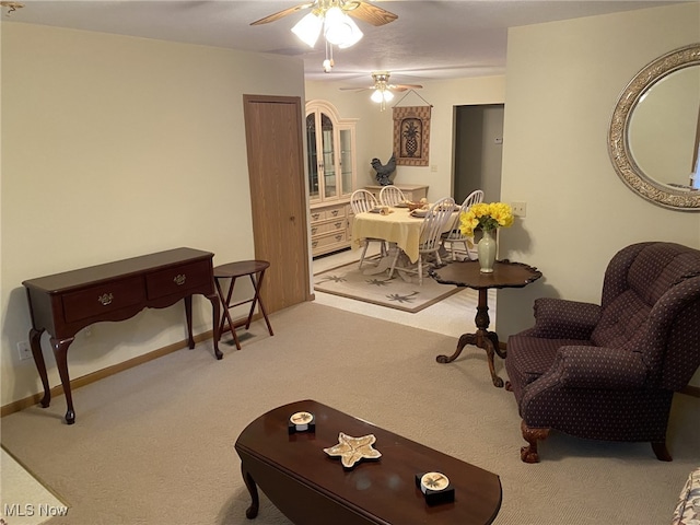 4865 Kathryn Dr, Geneva, OH 44041 - carpeted living room with ceiling fan
