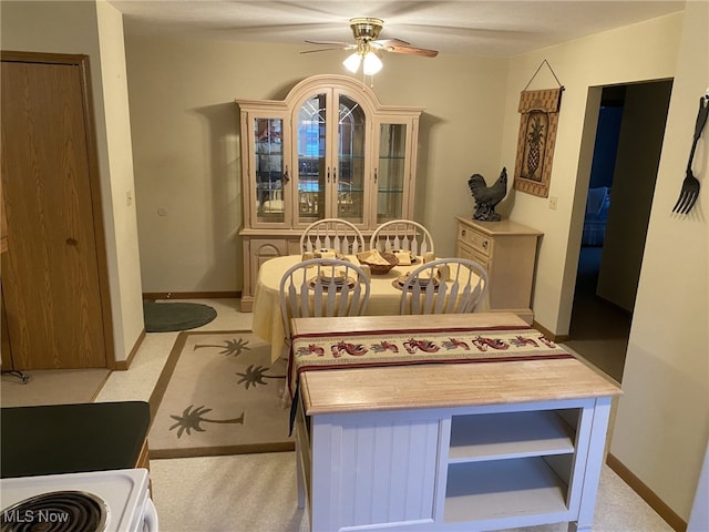 4865 Kathryn Dr, Geneva, OH 44041 - carpeted dining room with ceiling fan