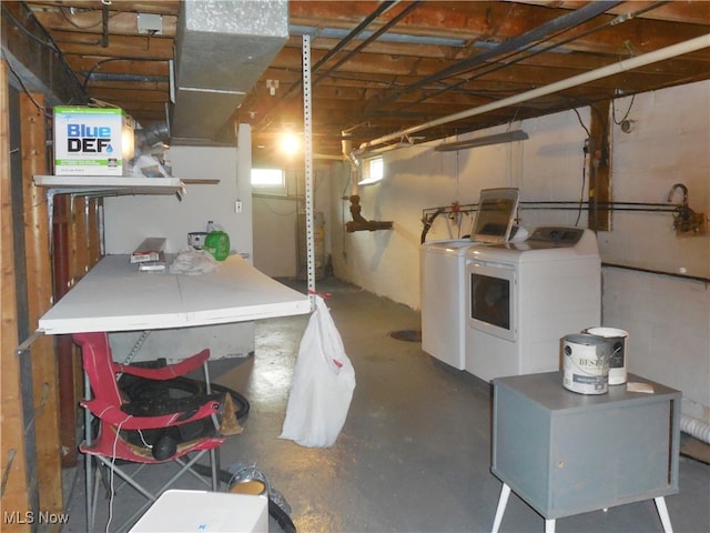 basement with separate washer and dryer