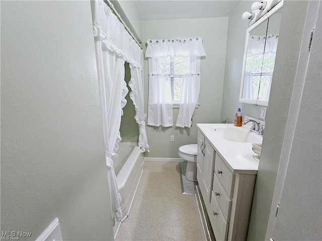 full bathroom featuring vanity, toilet, and shower / bath combo with shower curtain