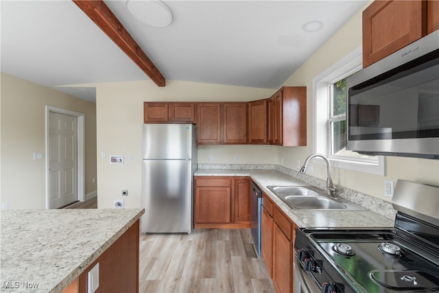 kitchen featuring light stone counters, stainless steel appliances, light wood-type flooring, vaulted ceiling with beams, and sink