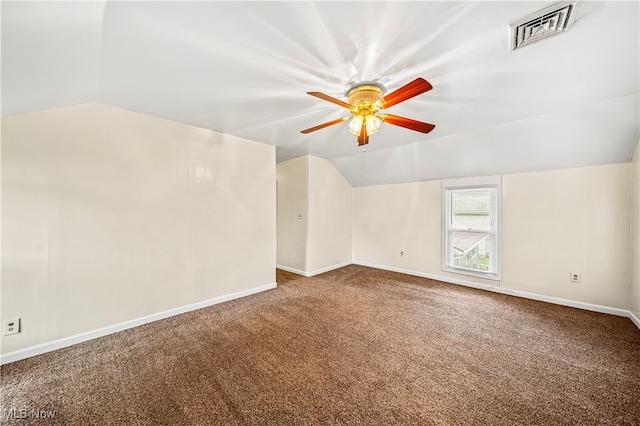 bonus room with lofted ceiling, ceiling fan, and carpet floors