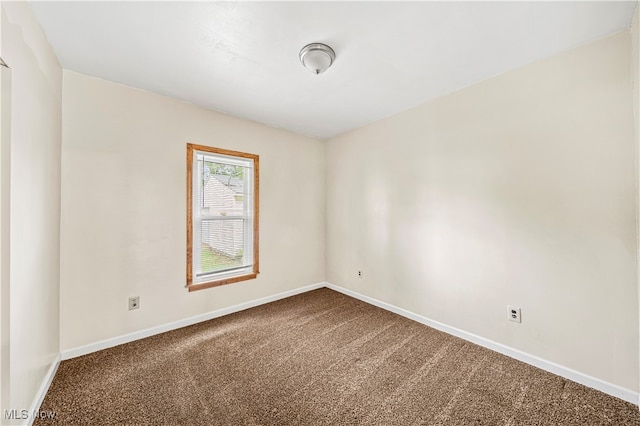 unfurnished room featuring carpet floors