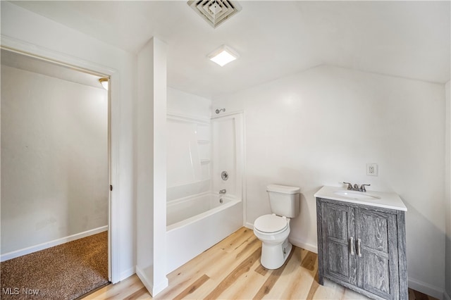 full bathroom featuring bathtub / shower combination, hardwood / wood-style floors, vanity, and toilet