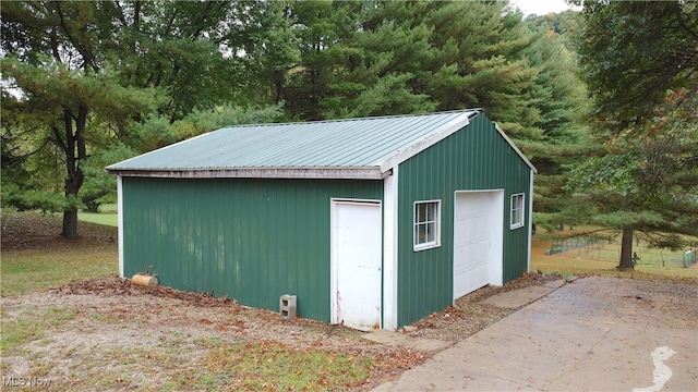 view of outbuilding featuring a garage