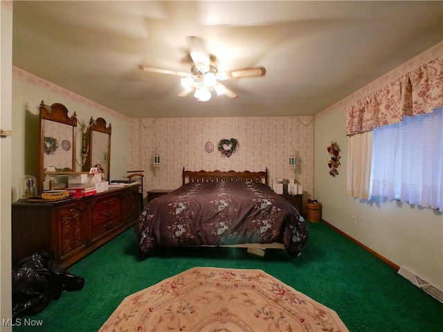 bedroom with ceiling fan and carpet floors