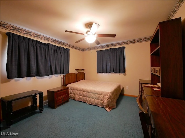 carpeted bedroom with ceiling fan