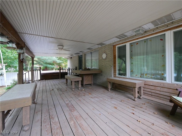 wooden deck with ceiling fan