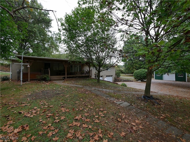 view of yard featuring a garage