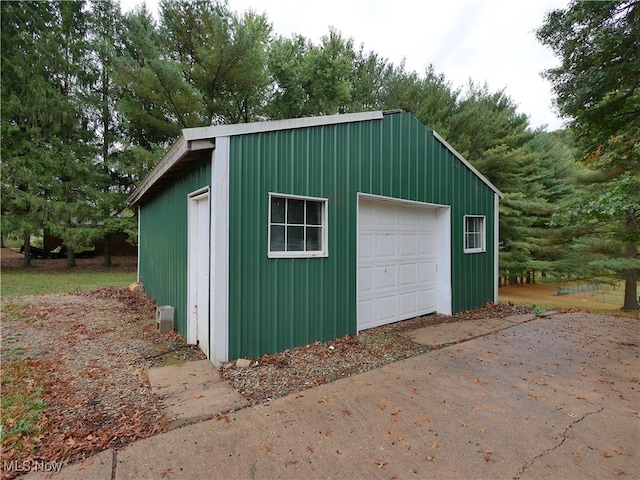 view of outbuilding with a garage