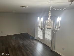 interior space featuring dark hardwood / wood-style flooring