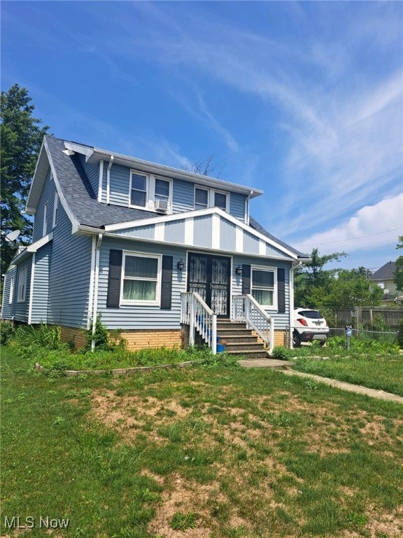 view of front of house featuring a front yard