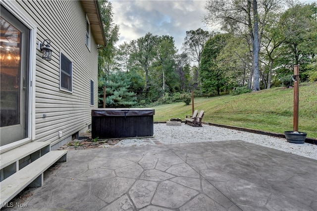 view of patio with a hot tub