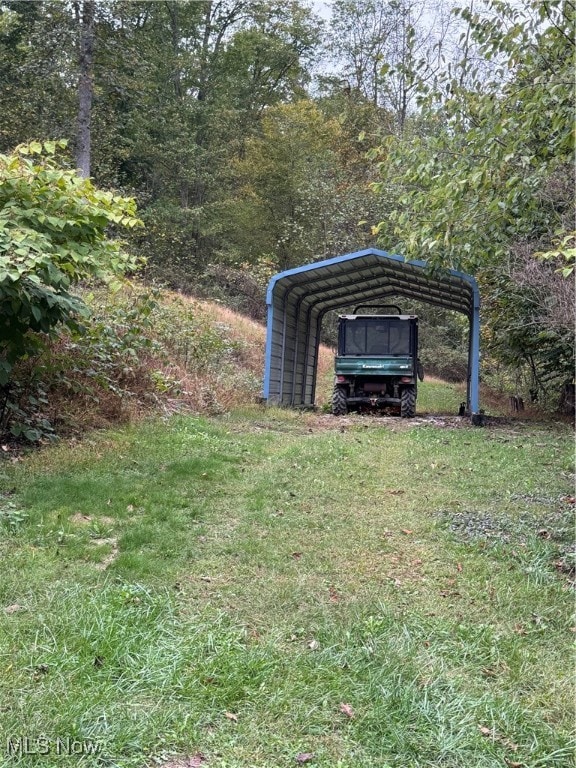 view of yard featuring a carport