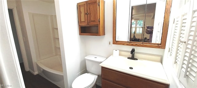 full bathroom with toilet, vanity, ceiling fan, and bathing tub / shower combination