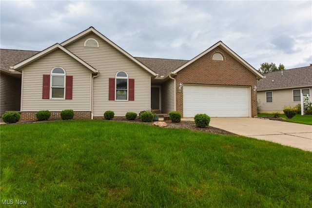 single story home with a front yard and a garage