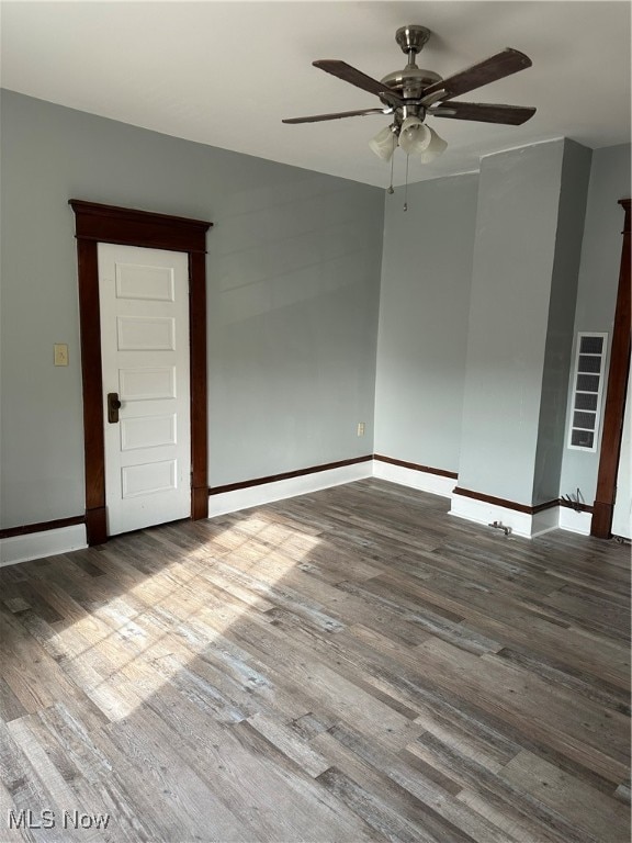 unfurnished room featuring ceiling fan and hardwood / wood-style flooring