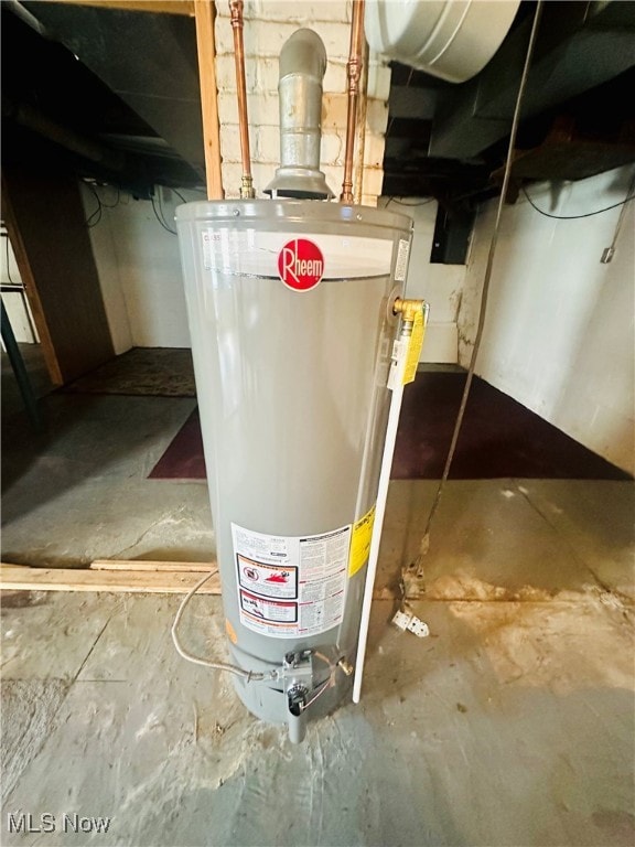 utility room with water heater