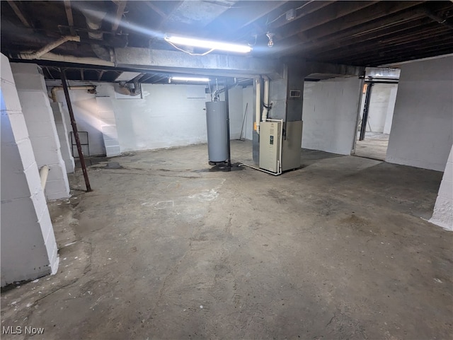 basement with gas water heater and heating unit