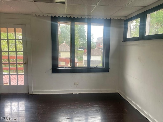 1006 Orchard St, Marietta, OH 45750 - empty room featuring a drop ceiling and a healthy amount of sunlight