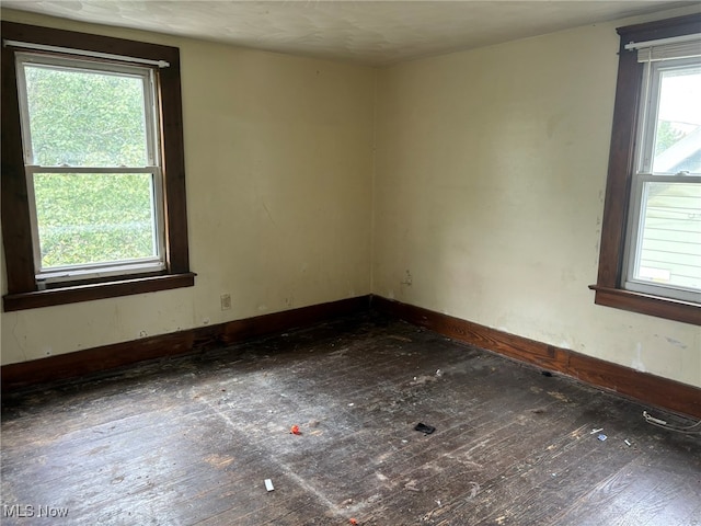 empty room featuring dark hardwood / wood-style floors