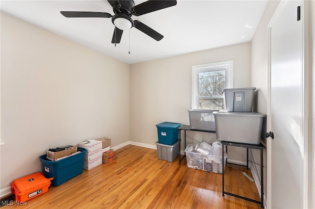 miscellaneous room featuring ceiling fan and wood-type flooring