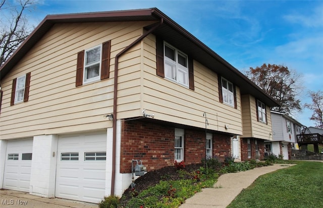 view of side of property with a garage