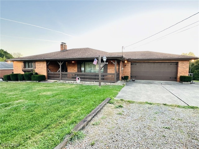 ranch-style house with a front lawn and a garage