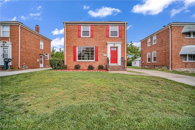 view of front of home with a front lawn