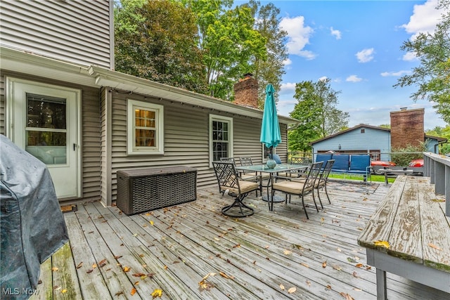 deck with an outdoor hangout area