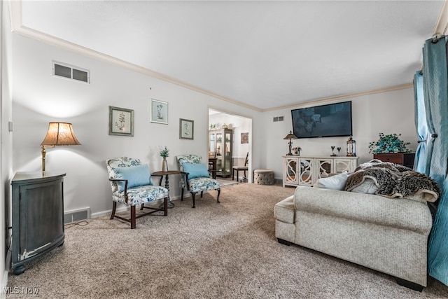 living room featuring ornamental molding and carpet