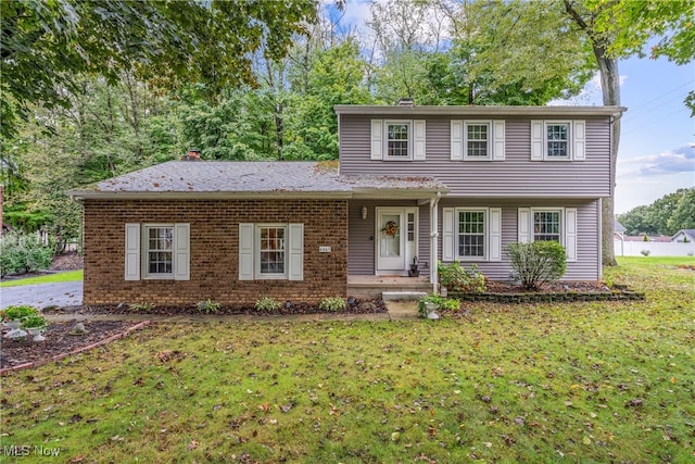 view of front of home with a front yard