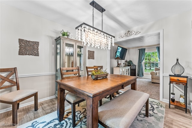 dining room featuring light hardwood / wood-style flooring