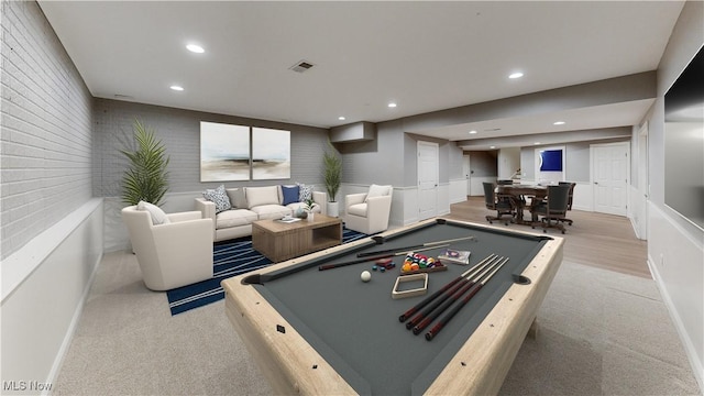 recreation room with light colored carpet and billiards