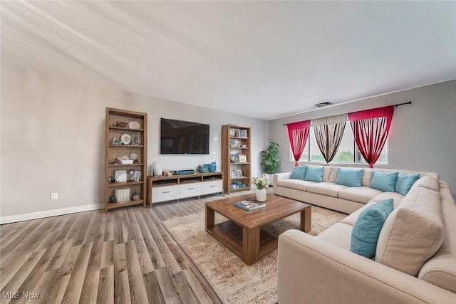 living room featuring light wood-type flooring