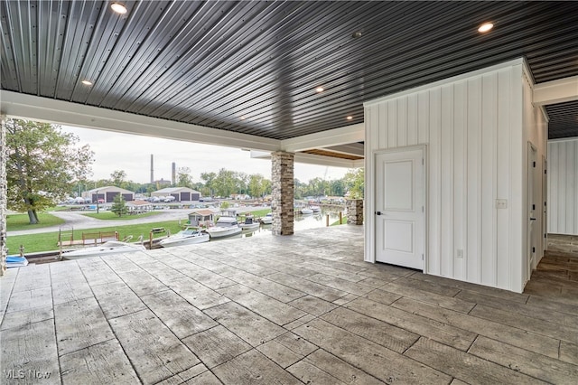 view of patio / terrace with a water view