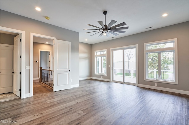 interior space featuring ceiling fan and light wood-type flooring