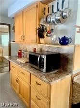 kitchen with light brown cabinetry