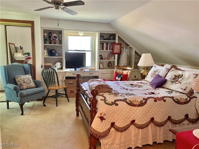 bedroom with vaulted ceiling, light carpet, and ceiling fan