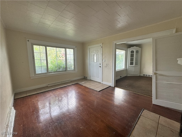 entryway with hardwood / wood-style flooring