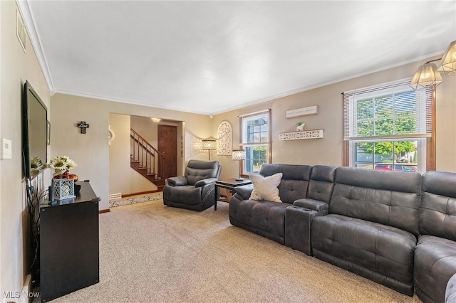 living room featuring carpet flooring, plenty of natural light, and ornamental molding