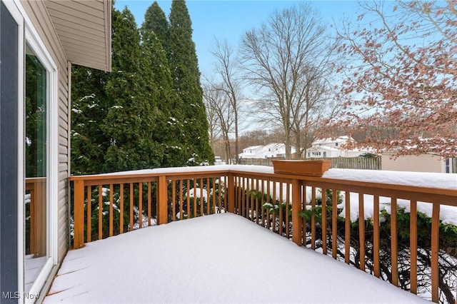 view of snow covered deck