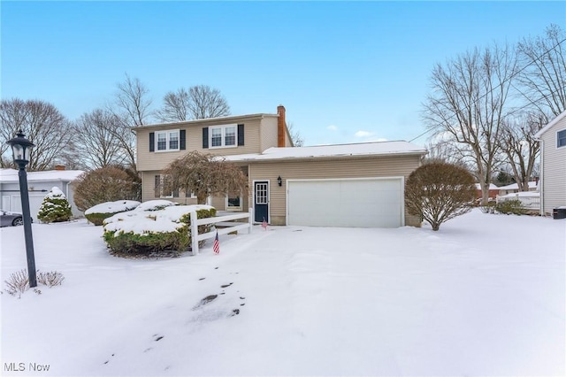 view of front of house with a garage