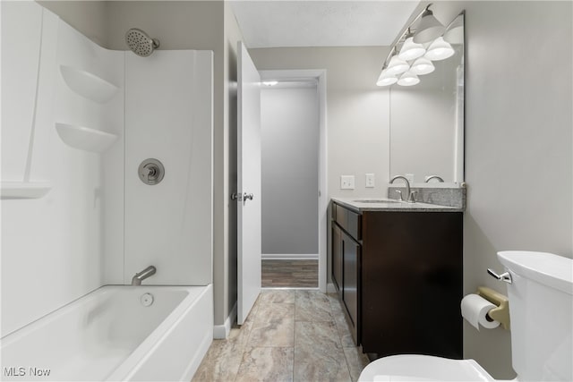 full bathroom with hardwood / wood-style floors, shower / bath combination, vanity, and toilet