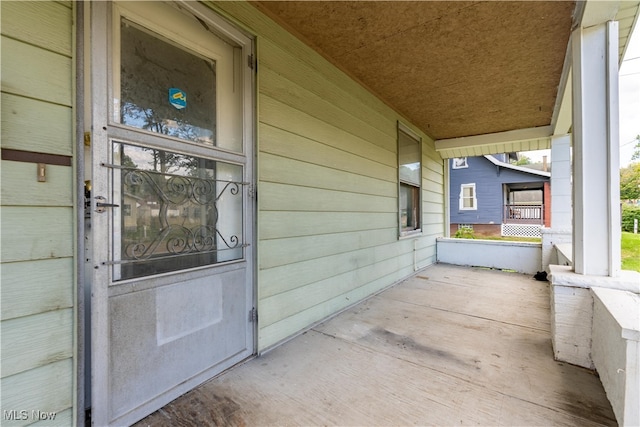 view of patio featuring a porch