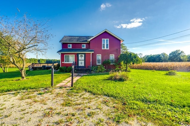 view of front of home with a front yard