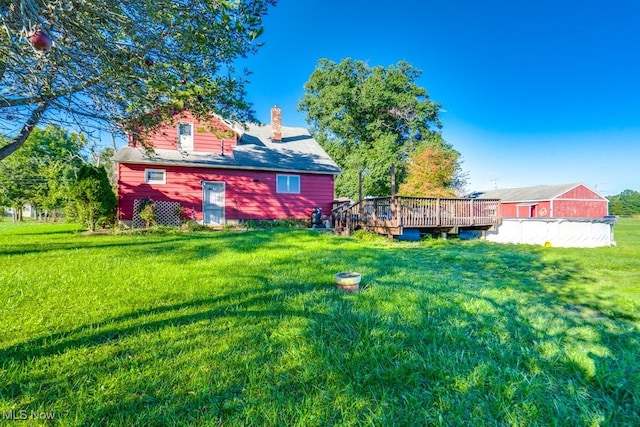 view of yard featuring a deck