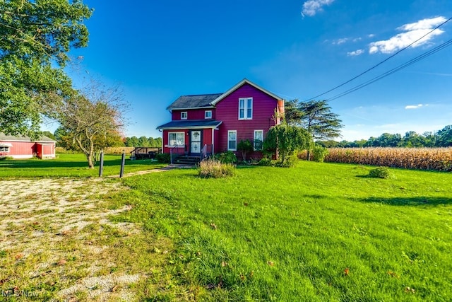 exterior space with a front lawn