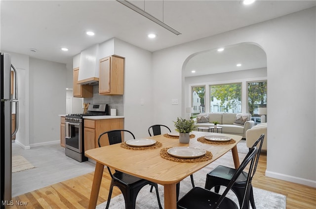 dining space featuring light hardwood / wood-style flooring